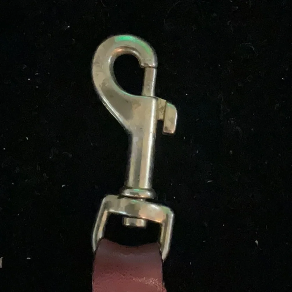 Cartier Elegant Red Leather Keychain with Gold Hardware